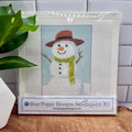 Blue Poppy Needlepoint Kit -Snowman with Green Scarf